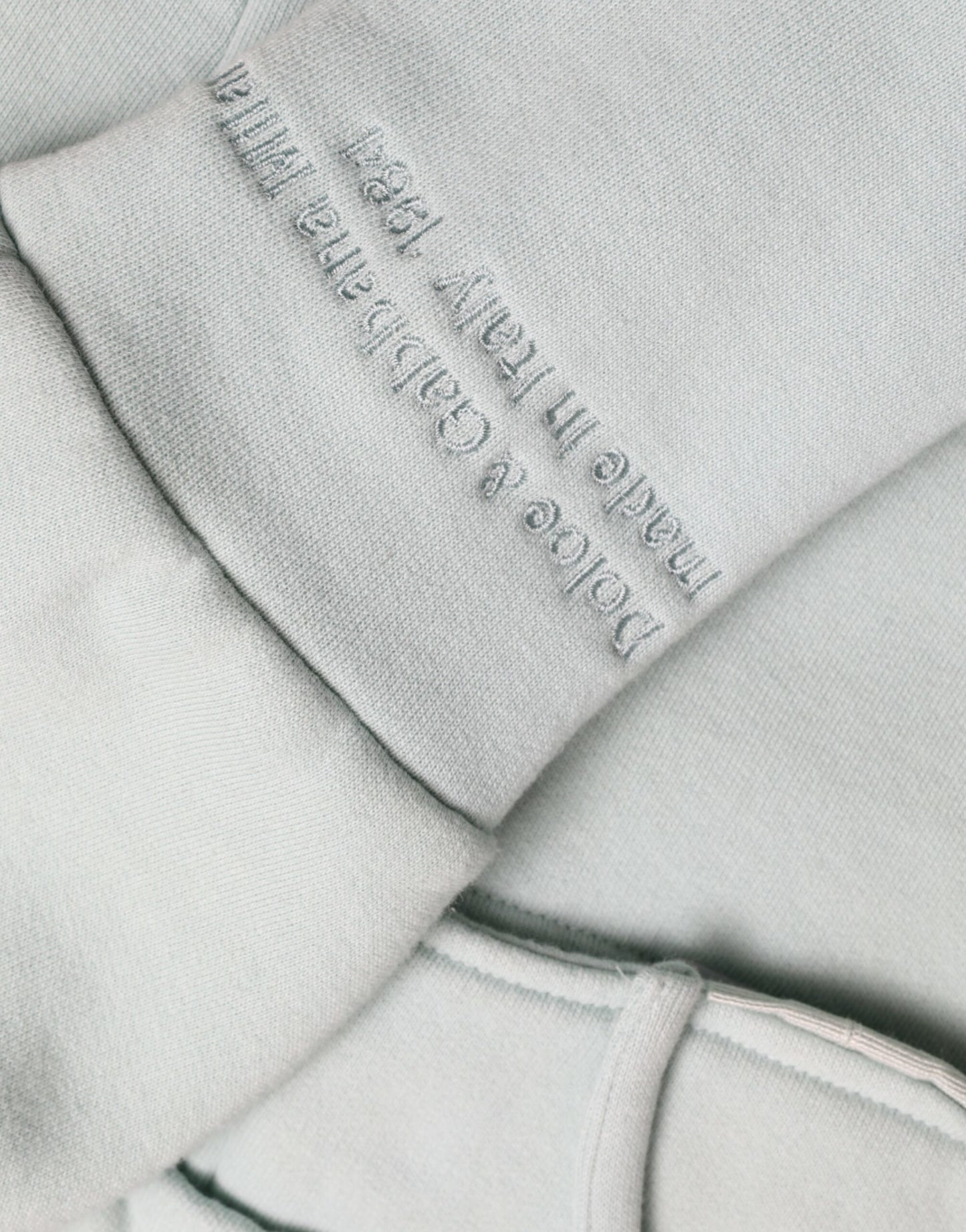 Dolce & Gabbana Mintgrüner Pullover aus Baumwolle mit Taschen