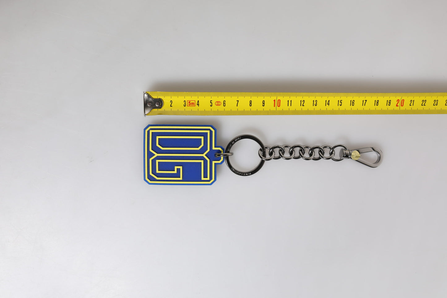 Dolce & Gabbana Blau Gelb DG Gummi Logo Silber Herrenschlüsselanhänger Schlüsselanhänger