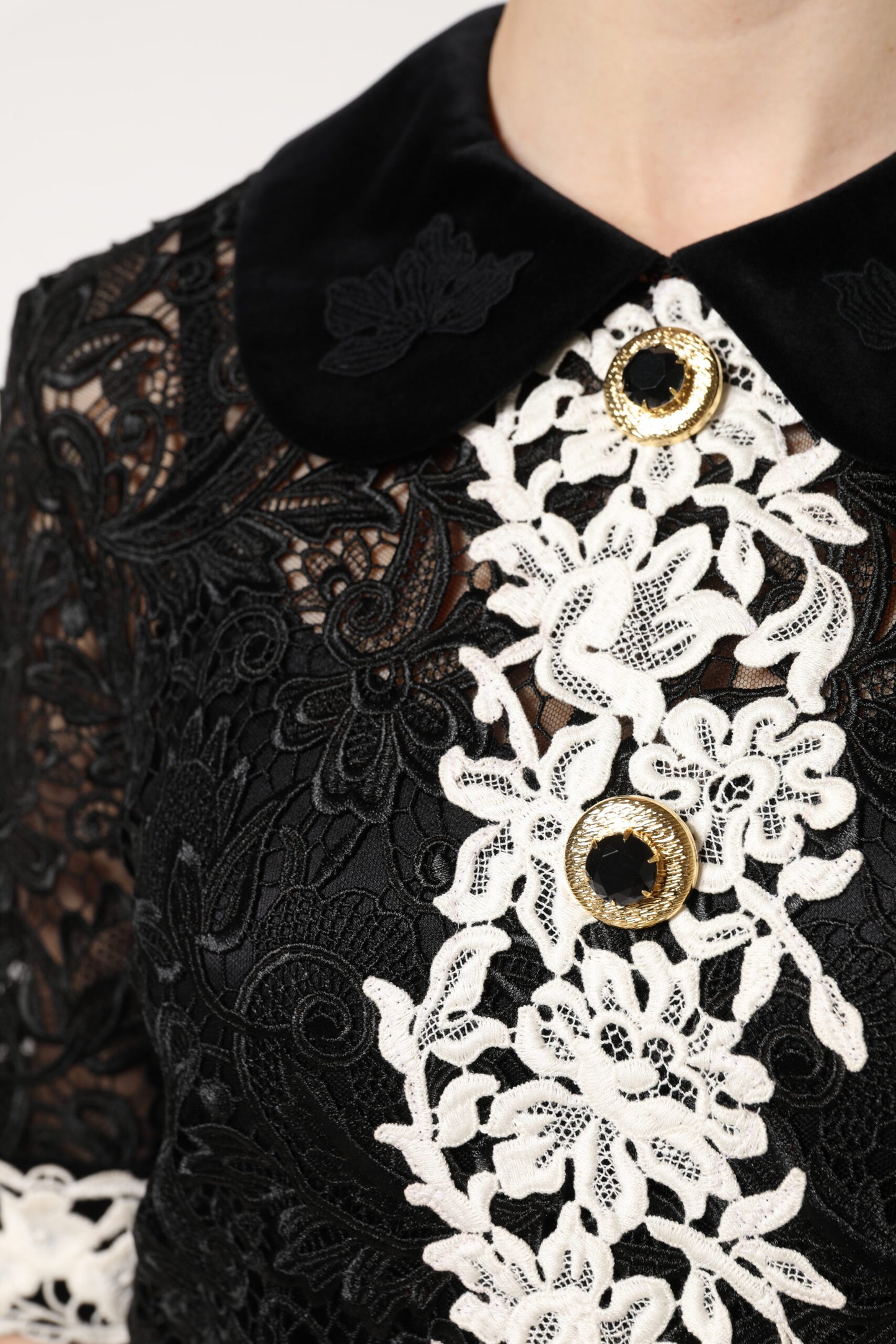 Dolce & Gabbana Schwarzes Minikleid mit floraler Spitze verschönert