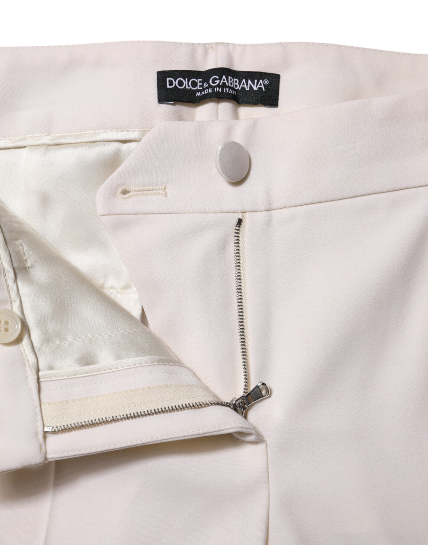 Dolce & Gabbana Weiße konisch zulaufende Hose aus Wolle mit mittlerer Taille