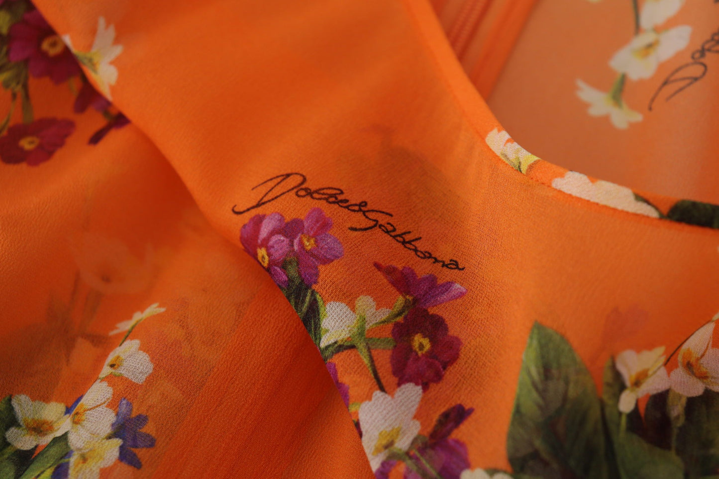 Dolce & Gabbana Orangefarbene Langarmbluse mit Blumendruck