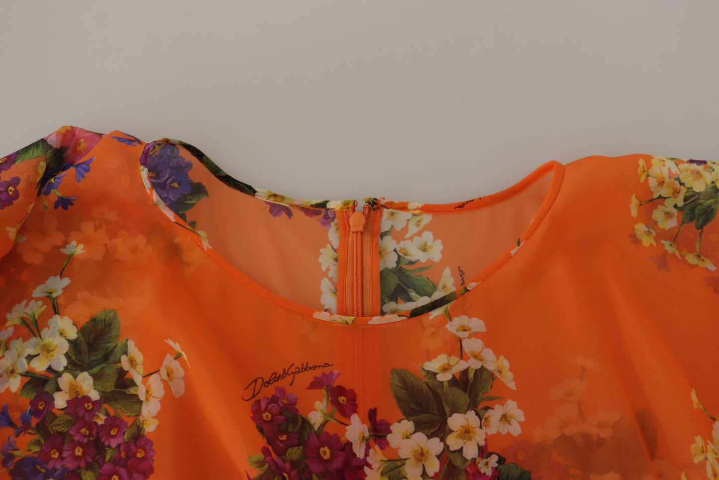Dolce & Gabbana Orangefarbene Langarmbluse mit Blumendruck