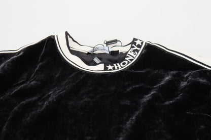 Dolce & Gabbana Schwarzer Pullover mit Rundhalsausschnitt aus Samt