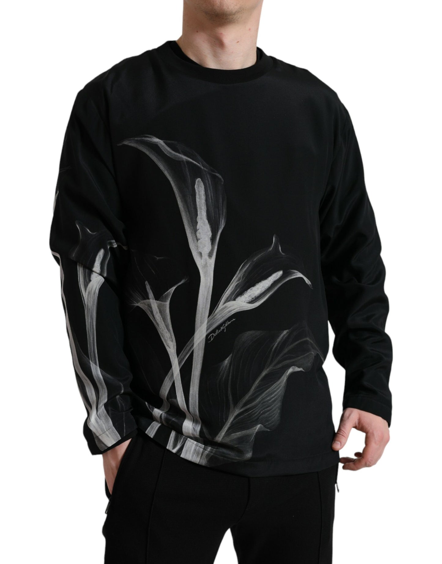 Dolce & Gabbana Schwarzer Pullover mit Blumendruck und Rundhalsausschnitt