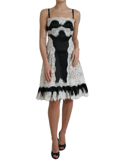 Dolce & Gabbana Schwarz-weißes ärmelloses Kleid aus Spitze mit A-Linie