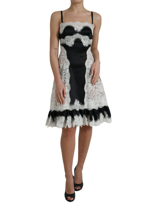 Dolce & Gabbana Schwarz-weißes ärmelloses Kleid aus Spitze mit A-Linie
