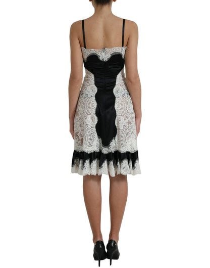 Dolce & Gabbana Schwarz-weißes ärmelloses Kleid aus Spitze mit A-Linie