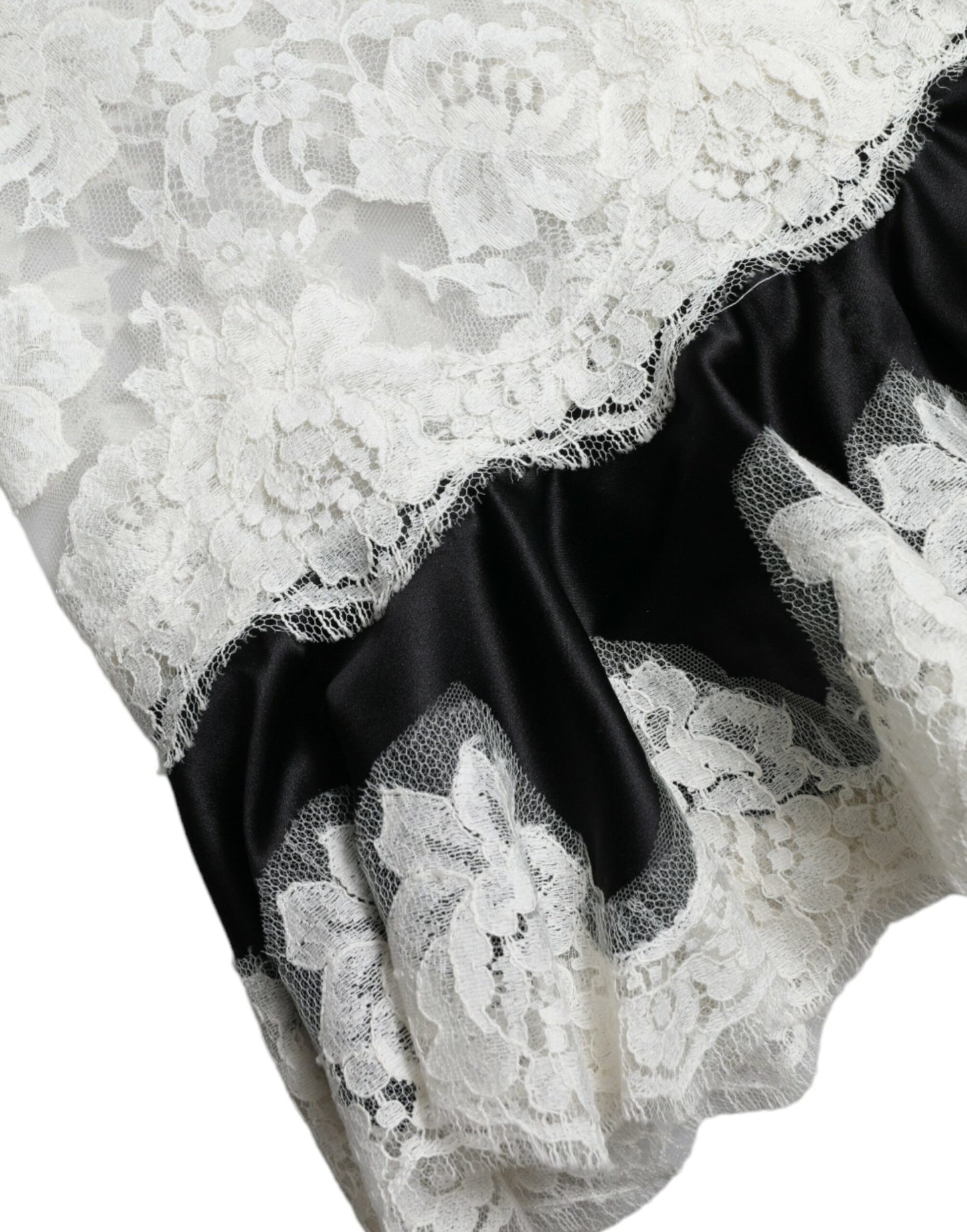 Dolce & Gabbana Schwarz-weißes ärmelloses Kleid aus Spitze mit A-Linie