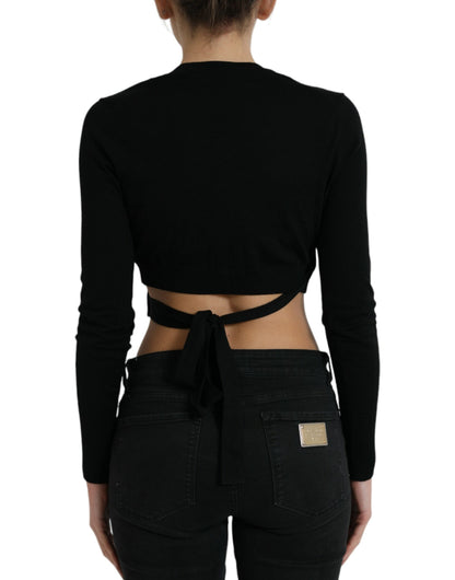 Dolce & Gabbana Schwarzer Wollpullover mit V-Ausschnitt und gekreuztem Kragen