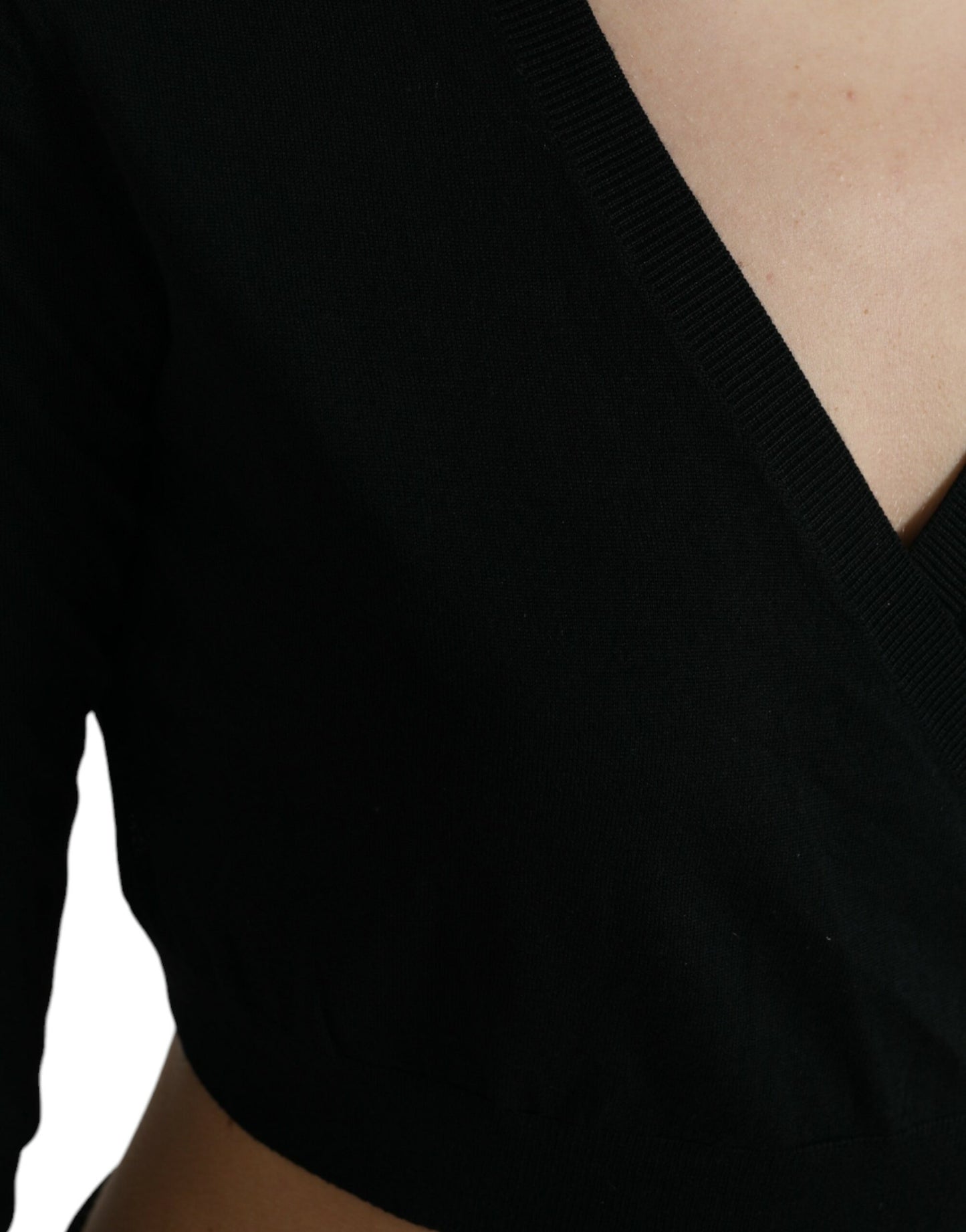 Dolce & Gabbana Schwarzer Wollpullover mit V-Ausschnitt und gekreuztem Kragen