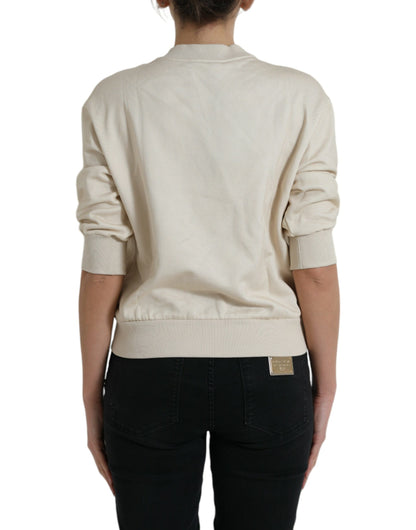 Dolce & Gabbana Beigefarbener Pullover aus bedruckter Baumwolle mit Dschungelmuster