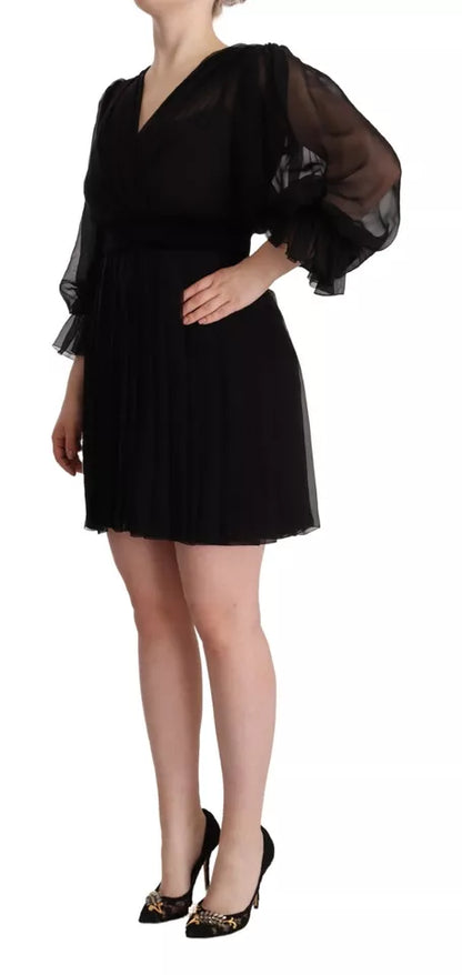 Dolce & Gabbana Schwarzes Minikleid mit V-Ausschnitt und langen Ärmeln in A-Linie
