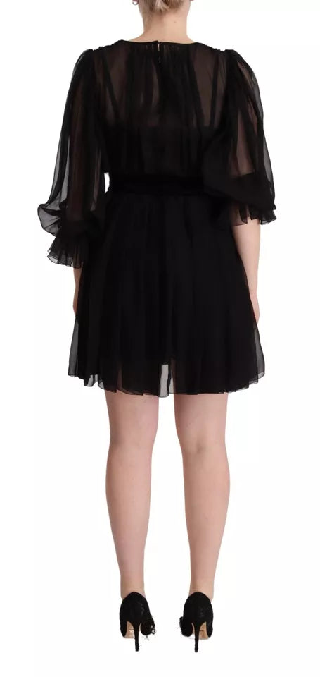 Dolce & Gabbana Schwarzes Minikleid mit V-Ausschnitt und langen Ärmeln in A-Linie