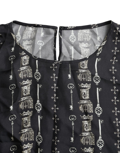Dolce & Gabbana Schwarzes Seidenblusen-T-Shirt mit Schlüsselanhänger