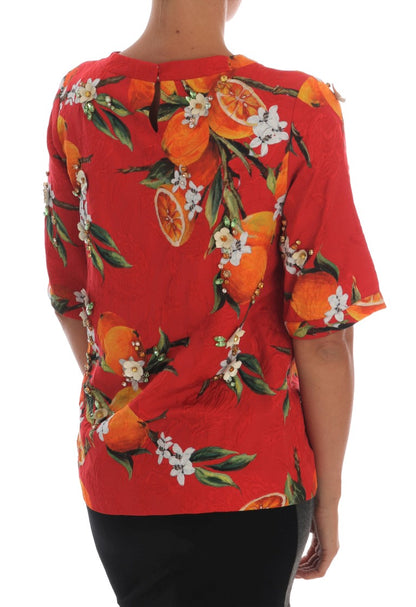 Dolce & Gabbana Orangefarbene Bluse mit Kristallverzierung