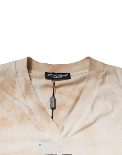 Dolce & Gabbana Beigefarbenes T-Shirt mit V-Ausschnitt aus Baumwolle mit Grafikdruck