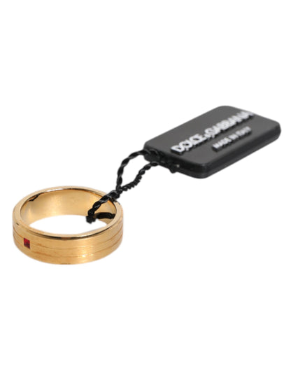 Dolce & Gabbana Goldfarbener Messingring mit rotem Kristall DG Logo