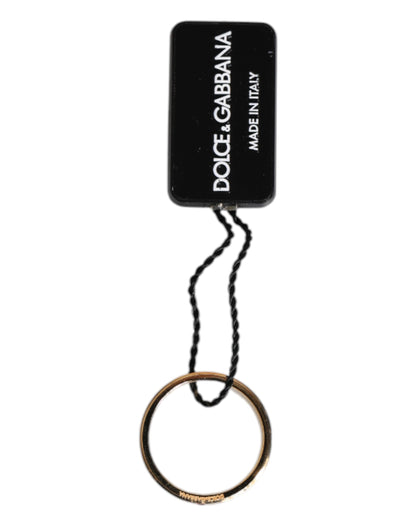 Dolce & Gabbana Goldfarbener Messingring mit rotem Kristall DG Logo