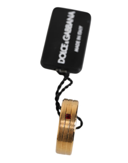 Dolce & Gabbana Goldfarbener Messingring mit rotem Kristall DG Logo