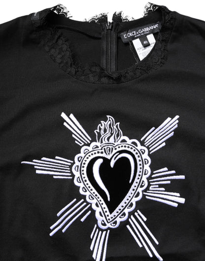 Dolce & Gabbana Schwarzes Top mit Rundhalsausschnitt aus transparenter Spitze Sacred Heart