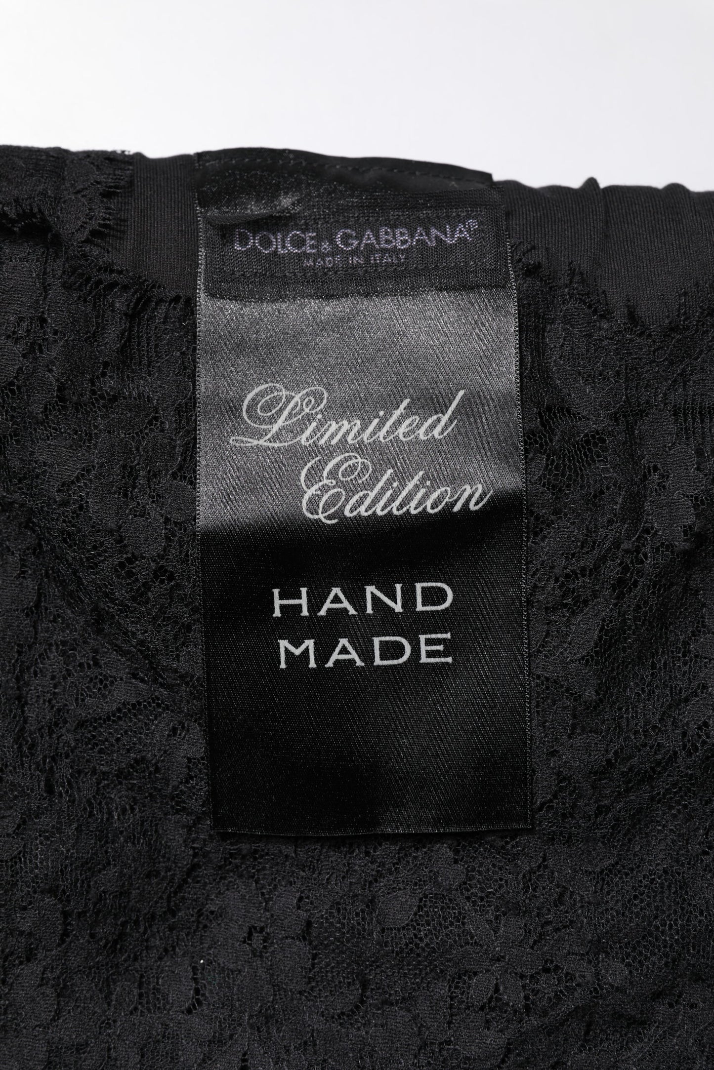 Dolce & Gabbana Schwarzes Top mit Rundhalsausschnitt aus transparenter Spitze Sacred Heart