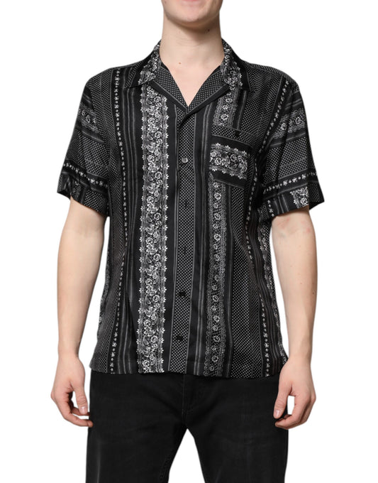 Dolce & Gabbana Schwarzes Seidenhemd mit Blumendruck und kurzen Ärmeln