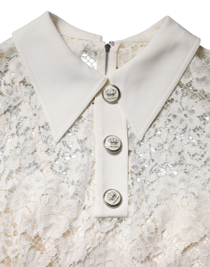 Dolce & Gabbana Weißes Kleid mit geblümter Spitze und langen Ärmeln in A-Linie