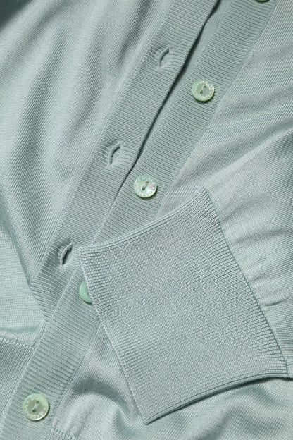 Dolce & Gabbana Hellgrüne Strickjacke aus Seide mit Knopfleiste