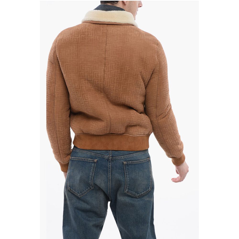 Balmain Bomberjacke aus Shearling mit Monogramm