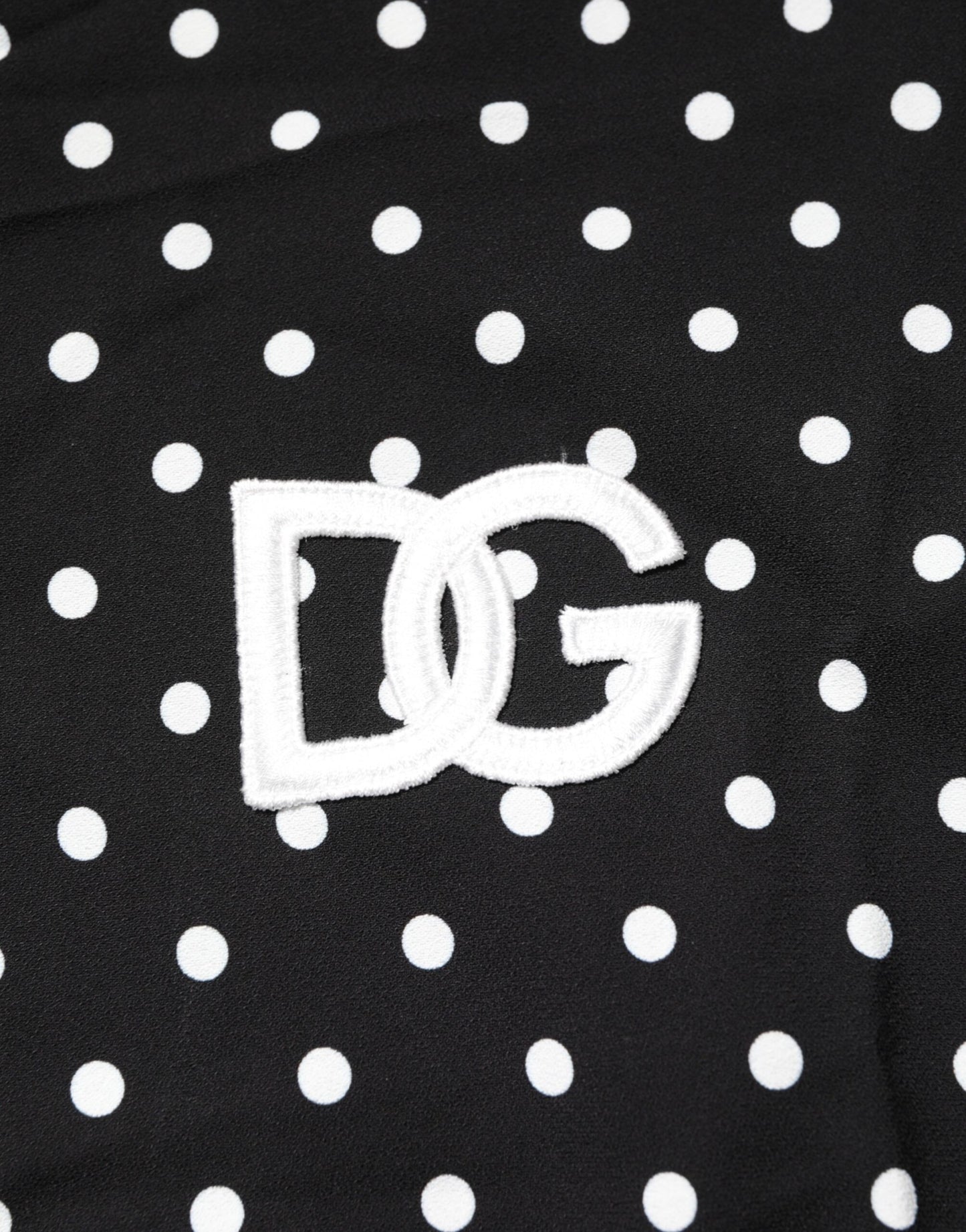 Dolce & Gabbana Schwarzes gepunktetes Polo-T-Shirt mit kurzen Ärmeln und Kragen