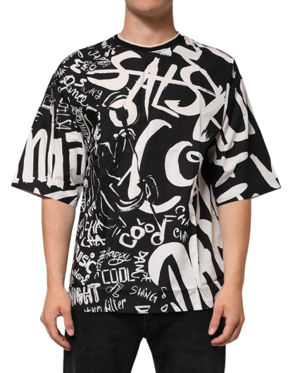 Dolce & Gabbana Schwarz-Weißes Graffiti-T-Shirt aus Baumwolle in Übergröße
