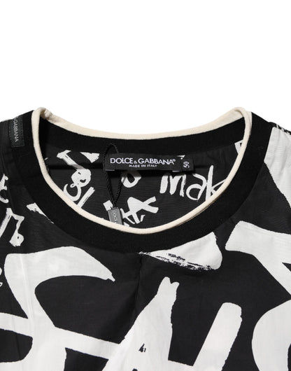 Dolce & Gabbana Schwarz-Weißes Graffiti-T-Shirt aus Baumwolle in Übergröße